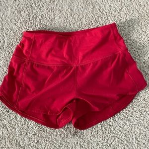 Lululemon speed ups 4inch shorts color: red size: 4